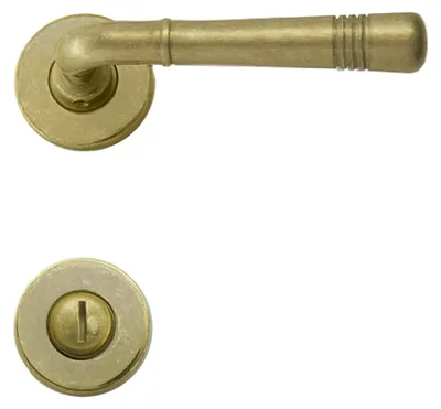Produktbild von Berlin R716 GHIDINI Türdrücker-Rosetten-Garnitur M3 Messing natur (Lochung: WC) Lochung: WC