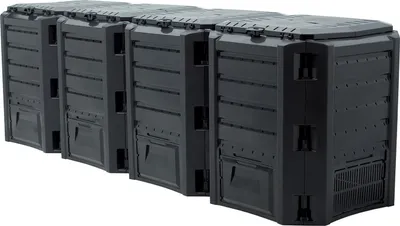 A row of four black compost bins lined up against a white background.