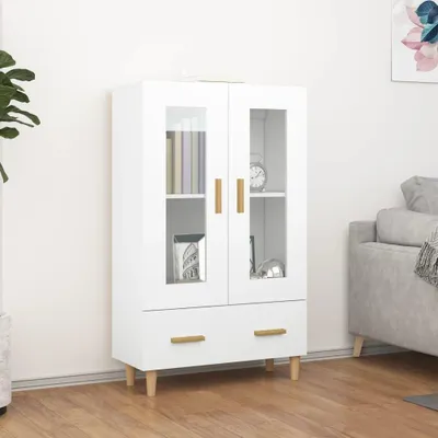 A white highboard with glass doors and drawers, displayed in a room setting with a sofa and a plant.