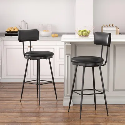 Two black bar stools are shown in a kitchen setting.