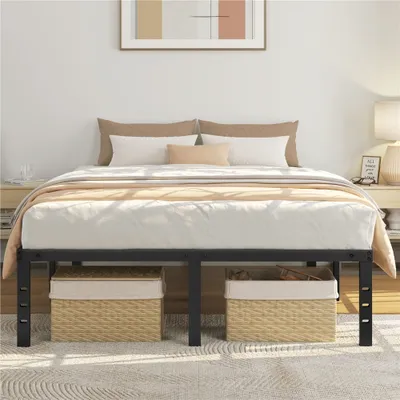 A bed frame with a mattress and bedding, set up in a bedroom with nightstands and artwork on the wall.