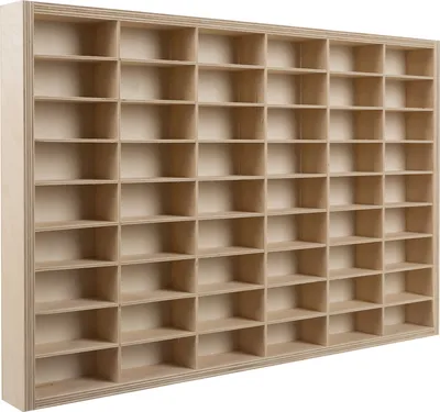 A wall-mounted wooden display shelf with many small compartments.