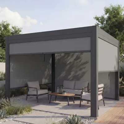 An outdoor patio area with a modern pergola, furnished with seating and a coffee table.