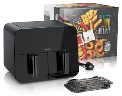 A black dual-chamber air fryer is shown next to its packaging, which features images of fried food.