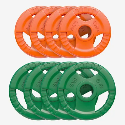 A set of orange and green weight plates stacked on a white background.
