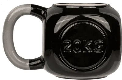 A black mug shaped like a dumbbell with '20KG' embossed on it.