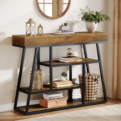 A console table with shelves is displayed in a room, decorated with various items.