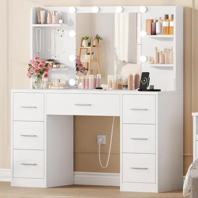 Immagine prodotto di Comò da trucco con illuminazione, specchio, prese di corrente e USB – 7 cassetti, 4 ripiani, 5 ganci per gioielli, bianco
