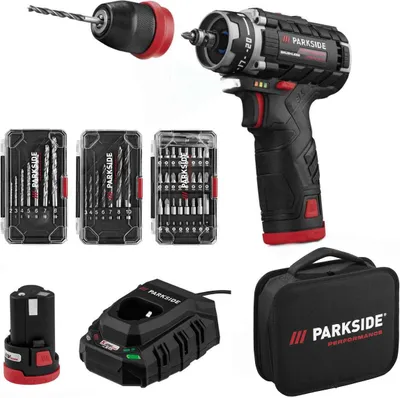 A collection of tools and accessories for a cordless drill, including the drill itself, batteries, charger, drill bits, screwdriver bits, and a storage bag.