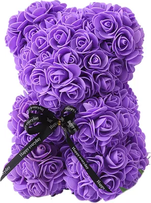 A close-up of a purple rose teddy bear with a black ribbon tied around its neck.