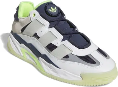 A studio shot of a single Adidas sneaker.