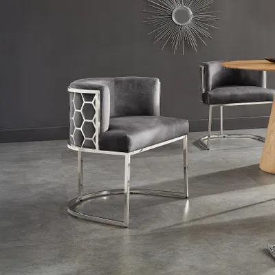 Produktbild von riess-ambiente Stilvoller Stuhl ELEGANCE grau Samt silber Edelstahl mit Armlehne Esszimmerstuhl