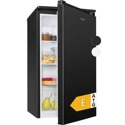 A black Bomann refrigerator with its door open, showing shelves with food items. The product is shown against a white background with color options and an energy efficiency label displayed on the door.