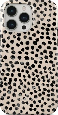 A close-up view of a phone case with a dalmatian-like pattern.