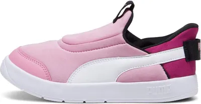 A side view of a pink Puma sneaker for children.