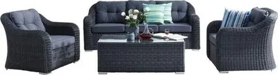 A three-piece rattan furniture set including a sofa and two armchairs, with a coffee table in the center.