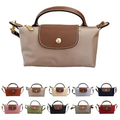 Produktbild von Mini Crossbody Tasche für Damen – Kleine Schultertasche mit verstellbarem Riemen – Reißverschlusstaschen – Leicht & langlebiges Kunstleder – für Alltag