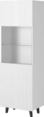 A white cabinet with fluted doors and a glass shelf.