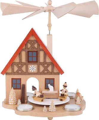 Imagen del producto de Casa piramidal de una planta con figuras de niños jugando en la nieve (29 cm) de Richard Glässer