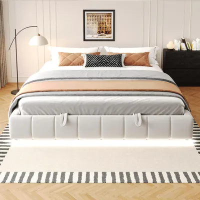 A bedroom scene featuring a bed with LED lighting and storage.