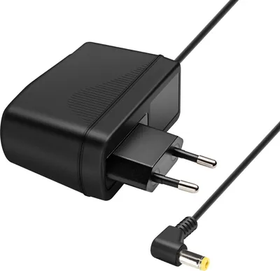 A black power adapter with a European plug and a connected cable with a barrel connector.