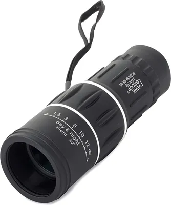 A black monocular telescope is shown against a black background.
