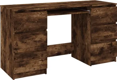 A wooden desk with drawers and a keyboard tray.
