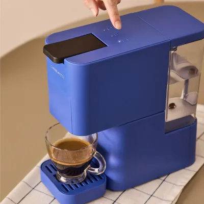 Produktbild von THERA STUDIO - Mehrkapsel-Express-Kaffeemaschine und gemahlener Kaffee