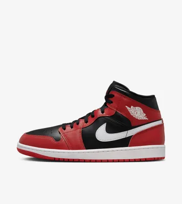 A side view of a Nike Air Jordan 1 Mid sneaker.