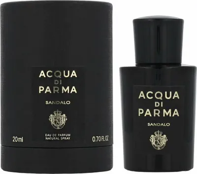 A black perfume bottle and its packaging are shown against a white background.