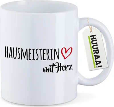 Produktbild von Huuraa Kaffeetasse Hausmeisterin mit Herz 330ml Weiß Keramik Kaffeebecher Geschenkidee