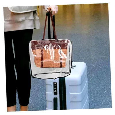 Produktbild von Regenschutz für Handtaschen aus wasserdichtem PVC mit schnellem Schutz und einfachem Verstauen
