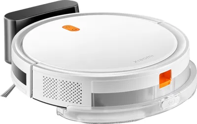 A white Xiaomi robot vacuum cleaner with orange accents and a black charging dock is shown against a white background.