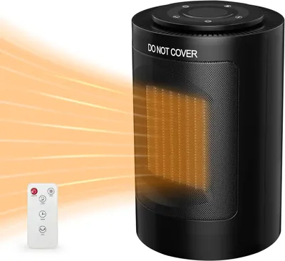 A black cylindrical ceramic heater with a remote control and orange heat waves emanating from it.