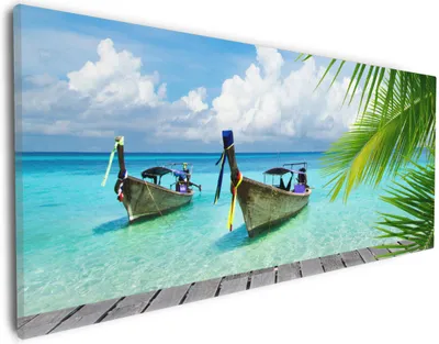 Produktbild von Wallario Premium Leinwandbild Sonnenboot in der Karibik in Größe 30 x 75 cm