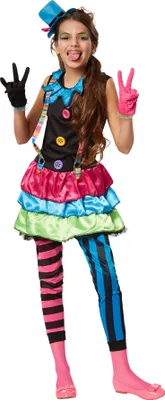 A young girl in a colorful clown costume posing against a white background.