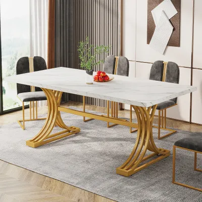 A dining table set in a modern dining room with chairs and decor.