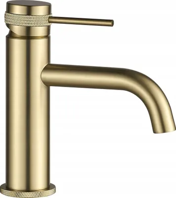 A close-up studio shot of a gold faucet.