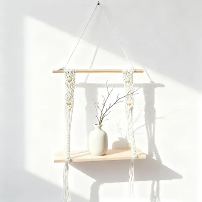 Imagen del producto de Estantería bohemia con borlas de madera flotante hechas a mano