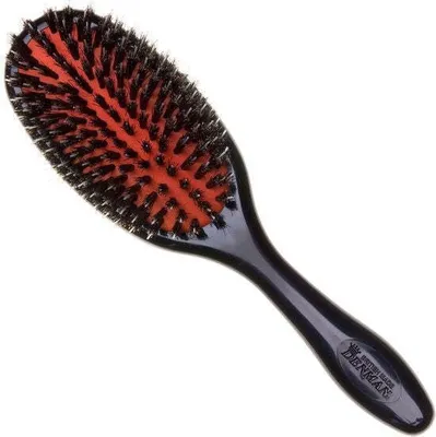 A black hairbrush with red bristles on a white background.