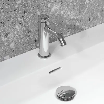 Zdjęcie produktu dla Bateria umywalkowa Ideal Standard Lastani z przyciskiem otwierającym zawór