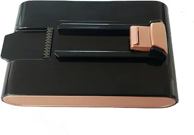 A black and copper colored battery pack for a vacuum cleaner, shown from a slightly elevated angle on a white background.