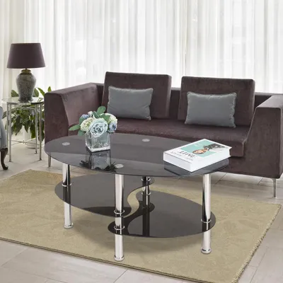 A living room scene with a couch, coffee table, and lamp.