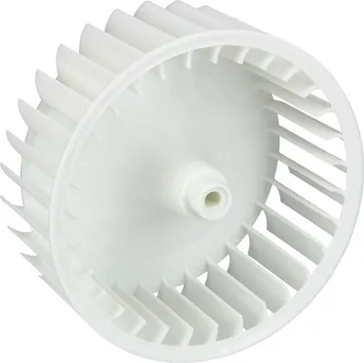 A white plastic fan wheel for a dryer.