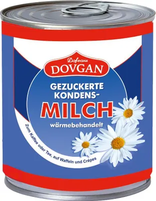 A can of condensed milk with daisies on the label.