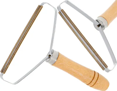 Two lint removers with wooden handles are arranged diagonally on a white background.