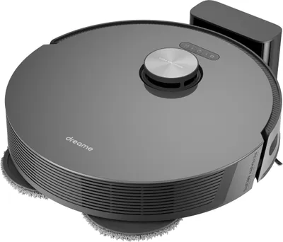 A dark gray robot vacuum cleaner with a charging dock in the background, shown from a slightly elevated angle on a white background.