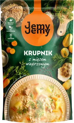 A pouch of Jemy Jemy Krupnik soup with pork, surrounded by ingredients like potatoes, carrots, and dill.