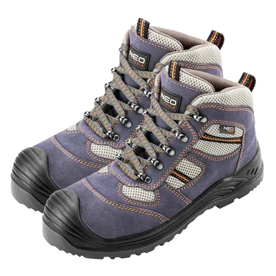 A pair of work boots on a white background.