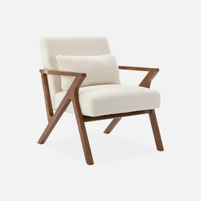 A cream-colored armchair with a wooden frame.